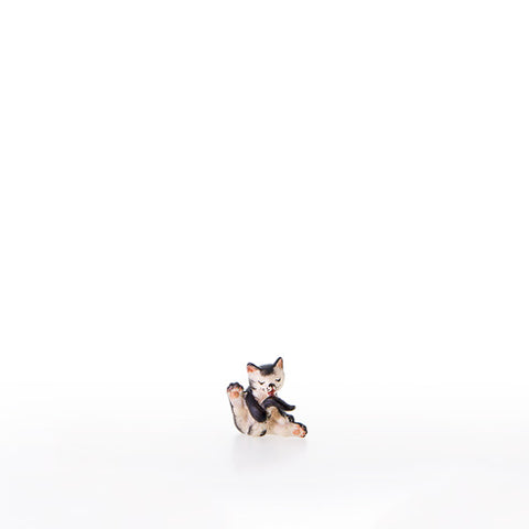 Nazarene Little Cat Licking Tail