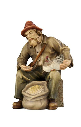 Rainell Shepherd sitting with Grain and Hen