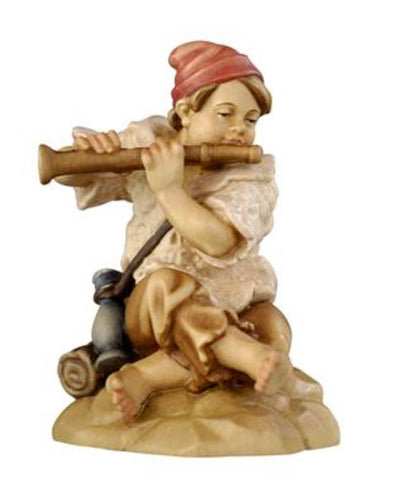 Rainell Boy Sitting with Flute