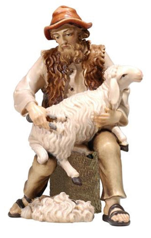 Kostner Shepherd Sitting with Sheep